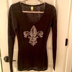 Black long sleeve Fleur-de-lis shirt.